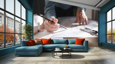 Architects interior designer hands working with Blue prints and documents for a home renovation for house design Wall mural